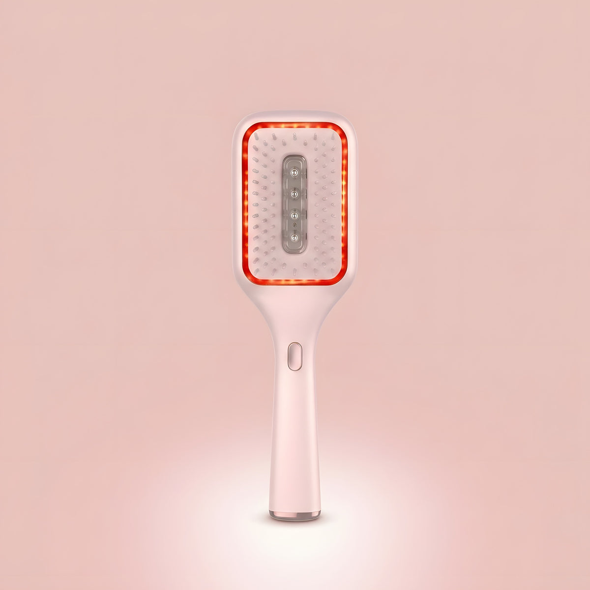 Elara Red Light Brush shown upright, white paddle brush with a glowing red LED ring around the bristles.